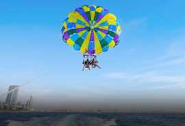 Soar Above Dubai: Enjoy 15% Off Parasailing with B