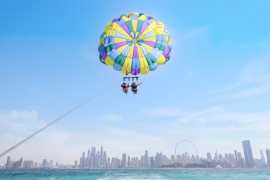 Soar Above Dubai: 15% Off Parasailing!